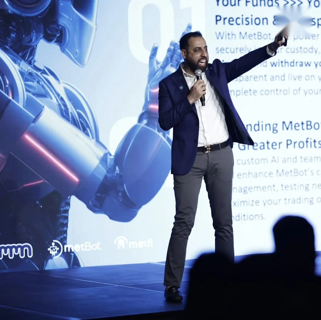 Said Rajeb speaking on stage